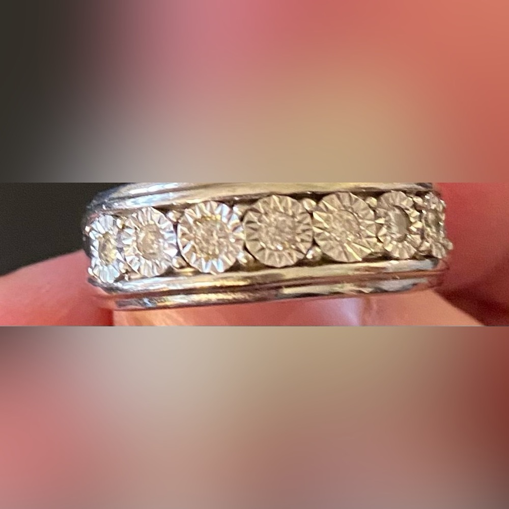 10k gold diamond. Man’s wedding band. Size 11.  Purchased from Kay Jeweler’s.